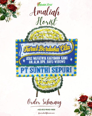 Papan Bunga Duka di Punggung Lading